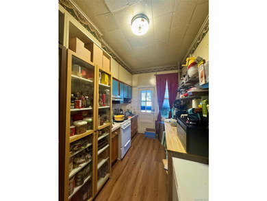 Welcome to this solid brick two-family home located in the heart - photo 3