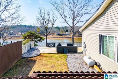 This one level lake front home offers 3 bedrooms and 2 full - photo 37