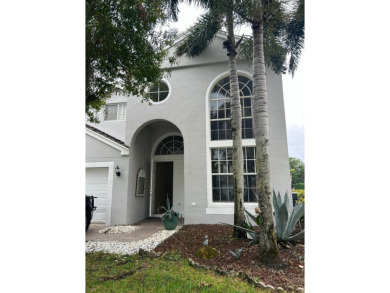 Lake Home For Sale in Royal Palm Beach, Florida