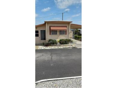 Lake Tarpon Home For Sale in Tarpon Springs Florida