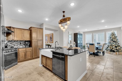 Step into a true open-concept layout where the kitchen, dining