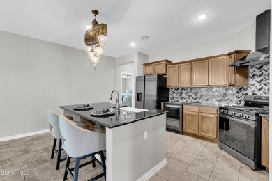 Step into a true open-concept layout where the kitchen, dining