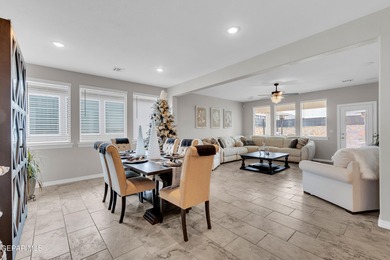 Step into a true open-concept layout where the kitchen, dining