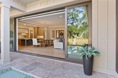 This distinctive custom-built residence nestled among the