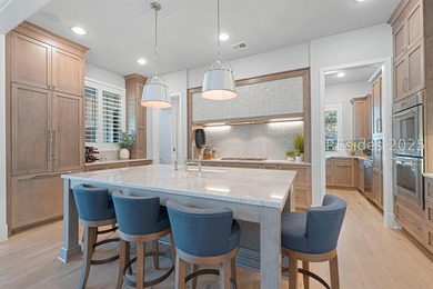 This distinctive custom-built residence nestled among the