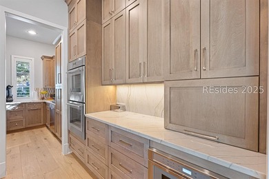 This distinctive custom-built residence nestled among the