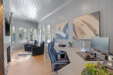 This distinctive custom-built residence nestled among the