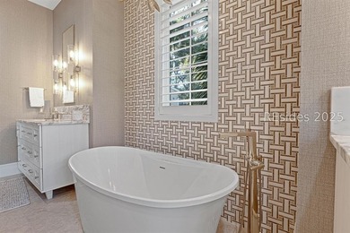 This distinctive custom-built residence nestled among the