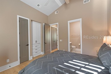 This distinctive custom-built residence nestled among the