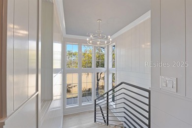 This distinctive custom-built residence nestled among the