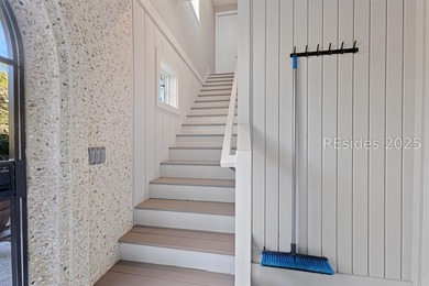 This distinctive custom-built residence nestled among the