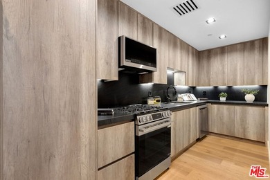 View property nestled in the hills of Encino, this newly - photo 15
