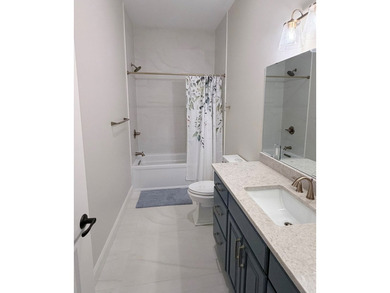 Custom lakefront home with high-end finishes + meticulous - photo 29