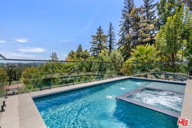 View property nestled in the hills of Encino, this newly - photo 35