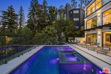 View property nestled in the hills of Encino, this newly - photo 37