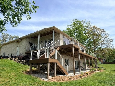 Custom lakefront home with high-end finishes + meticulous - photo 40