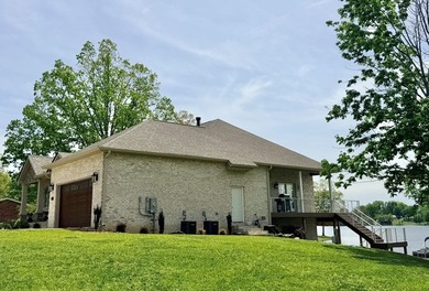 Custom lakefront home with high-end finishes + meticulous - photo 50