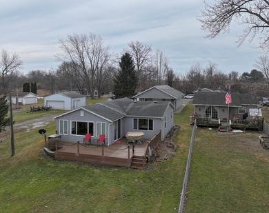 This charming one-story waterfront home on Lake Bruce offers an - photo 7