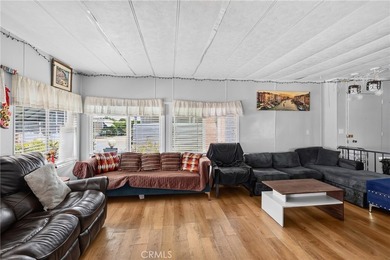 Welcome to this inviting 3-bedroom, 2-bath mobile home offering - photo 12