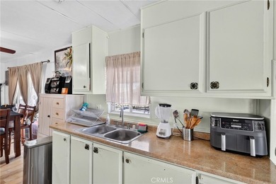 Welcome to this inviting 3-bedroom, 2-bath mobile home offering - photo 17