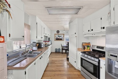 Welcome to this inviting 3-bedroom, 2-bath mobile home offering - photo 19