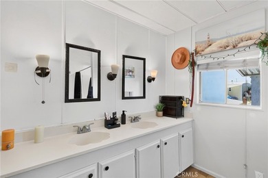 Welcome to this inviting 3-bedroom, 2-bath mobile home offering - photo 29