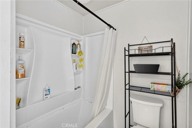 Welcome to this inviting 3-bedroom, 2-bath mobile home offering - photo 36