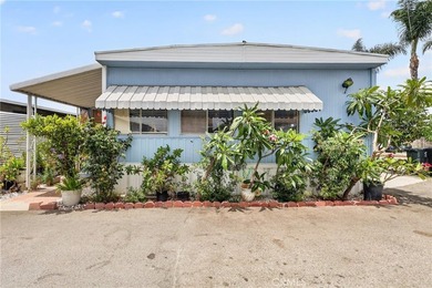 Welcome to this inviting 3-bedroom, 2-bath mobile home offering - photo 40