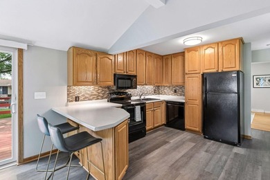 This walkout rambler is nestled on a quiet street with easy - photo 21