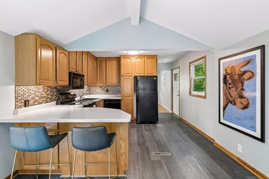 This walkout rambler is nestled on a quiet street with easy - photo 22