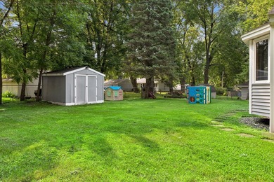 This walkout rambler is nestled on a quiet street with easy - photo 32