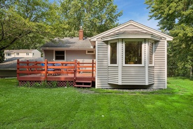 This walkout rambler is nestled on a quiet street with easy - photo 33