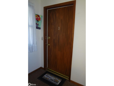 This charming second floor condo features 2 bedrooms, 1 full