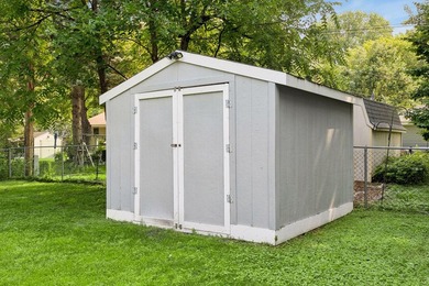This walkout rambler is nestled on a quiet street with easy - photo 38