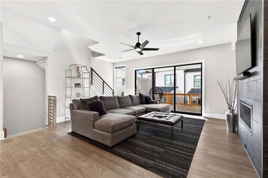 Just one year old and like new, this luxury townhome is located