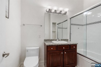 Luxury awaits in this 3-bedroom + bonus room, 2-bath penthouse