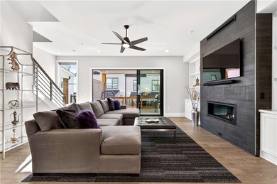 Just one year old and like new, this luxury townhome is located