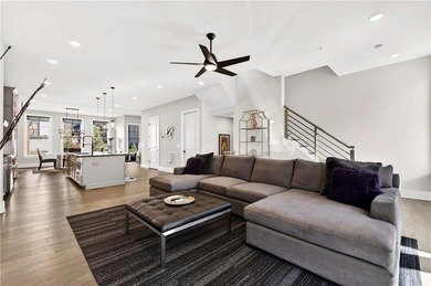 Just one year old and like new, this luxury townhome is located