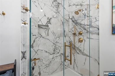 Luxury awaits in this 3-bedroom + bonus room, 2-bath penthouse