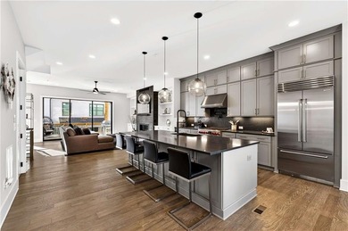 Just one year old and like new, this luxury townhome is located