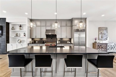 Just one year old and like new, this luxury townhome is located