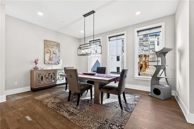 Just one year old and like new, this luxury townhome is located