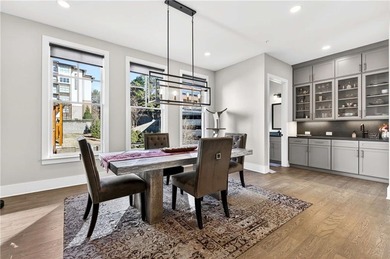 Just one year old and like new, this luxury townhome is located