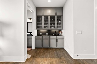 Just one year old and like new, this luxury townhome is located