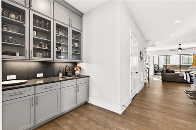 Just one year old and like new, this luxury townhome is located