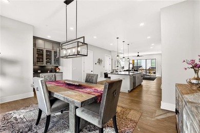 Just one year old and like new, this luxury townhome is located