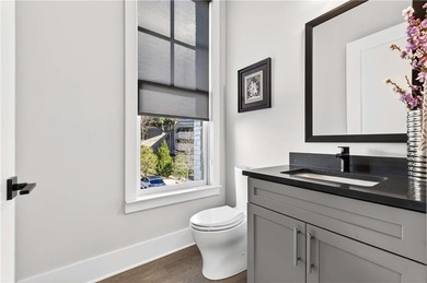 Just one year old and like new, this luxury townhome is located