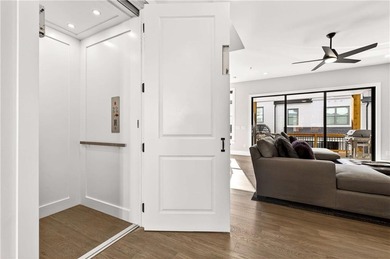 Just one year old and like new, this luxury townhome is located