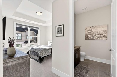 Just one year old and like new, this luxury townhome is located