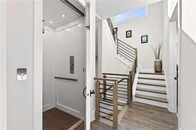 Just one year old and like new, this luxury townhome is located